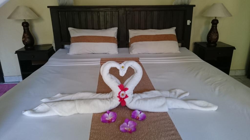 Barracuda Beach Hostel Amed Kültér fotó